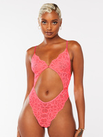 Savage X Bea – BEAUTY BEA Lace body suit, paired with a red New