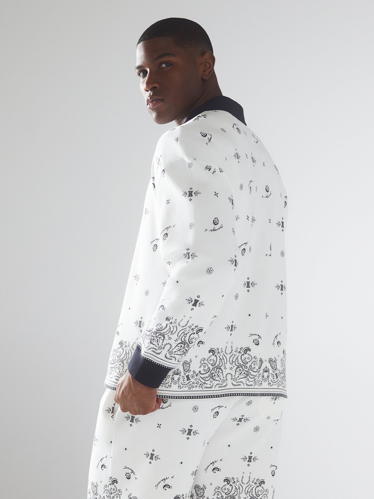 Xssential Terry Long-Sleeve Polo in Black & Multi